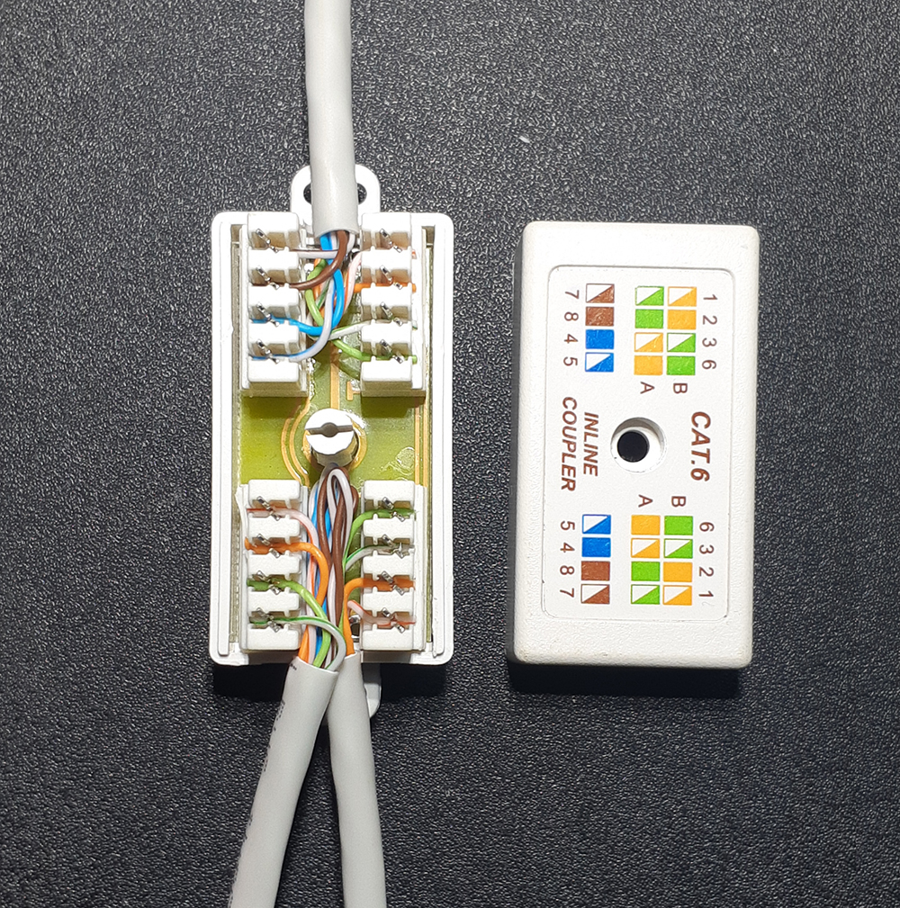 Соединение сетевого интернет кабеля. Разветвление витой пары rj45. Соединение кабель интернета rj45 скрутка. Соединитель двух проводов витой пары RJ-45. Соединительный коннектор витой пары к2.